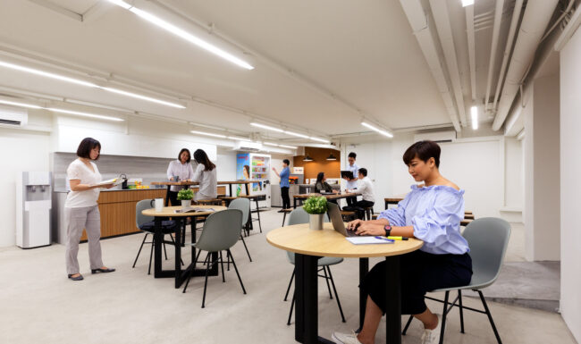 Office interior with people working